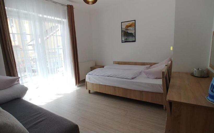 Quarto Triplo Estandar com Sacada, Riwiera Dźwirzyno
