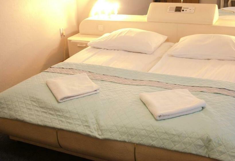 סטודיו משפחתי, Pensjonat Malwa