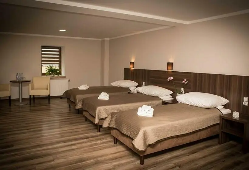 コンフォートトリプルルーム, Apartamentowiec Kuźniar