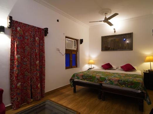 Quarto deluxe, Yogis Guest House