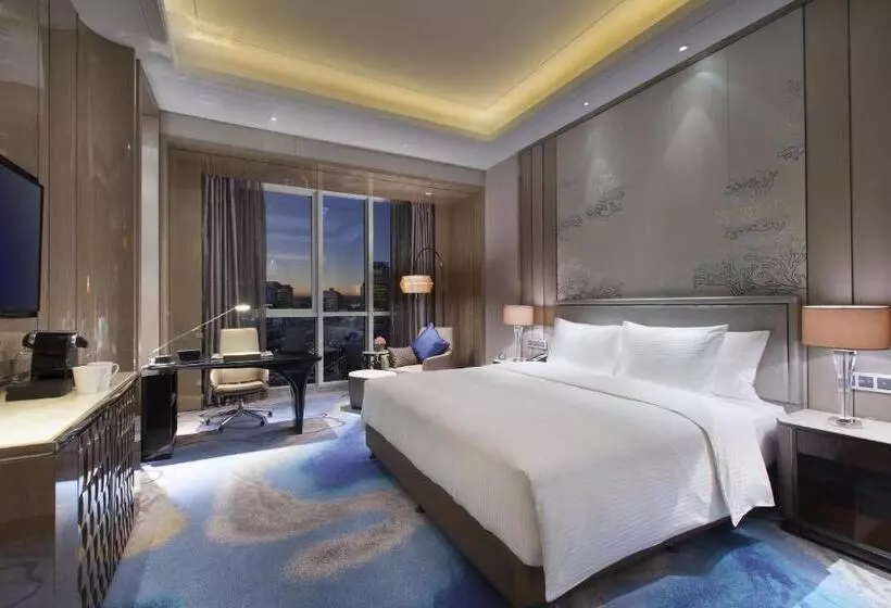 キングサイズベッドのエクゼクティブルーム, Pullman Yantai Center