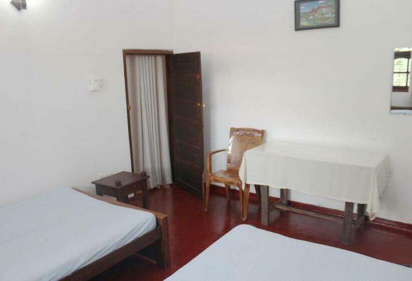 Quarto Estandar Vista Jardim, Grand Villa