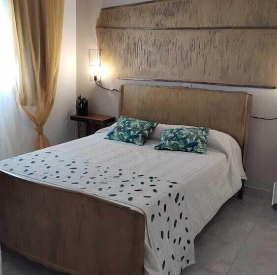 חדר סטנדרט לארבעה, Carod Espacio Serrano