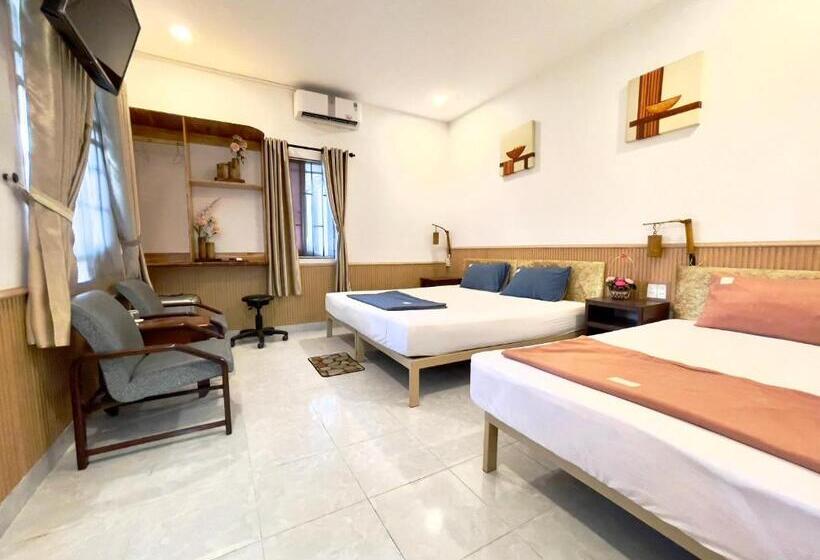 اتاق استاندارد سه تخته با چشمانداز باغ, Homestay Minh Tú