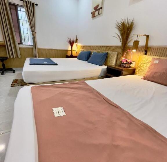 اتاق استاندارد سه تخته با چشمانداز باغ, Homestay Minh Tú