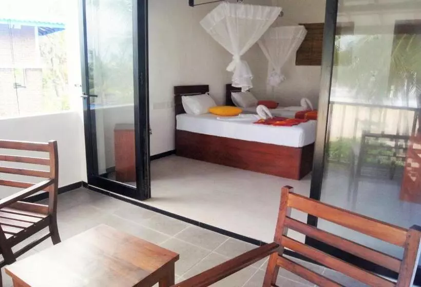 オーシャンビューデラックスルームバルコニー付き, Wellé Wadiya Beach Villa