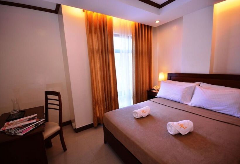 디럭스 룸 킹사이즈 침대, Ipil Suites Puerto Princesa