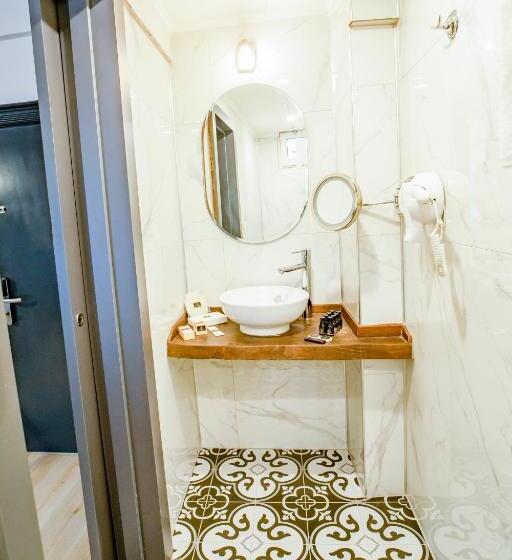 Quarto standart vista jardim, Aksular