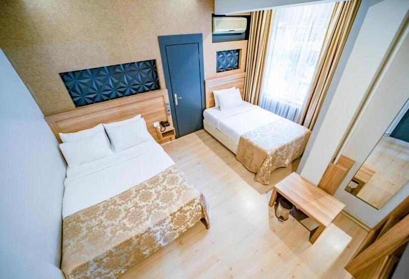 اتاق استاندارد سه تخته با چشم‌انداز باغ, Aksular