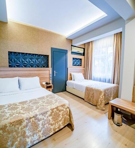 اتاق استاندارد سه تخته با چشم‌انداز باغ, Aksular