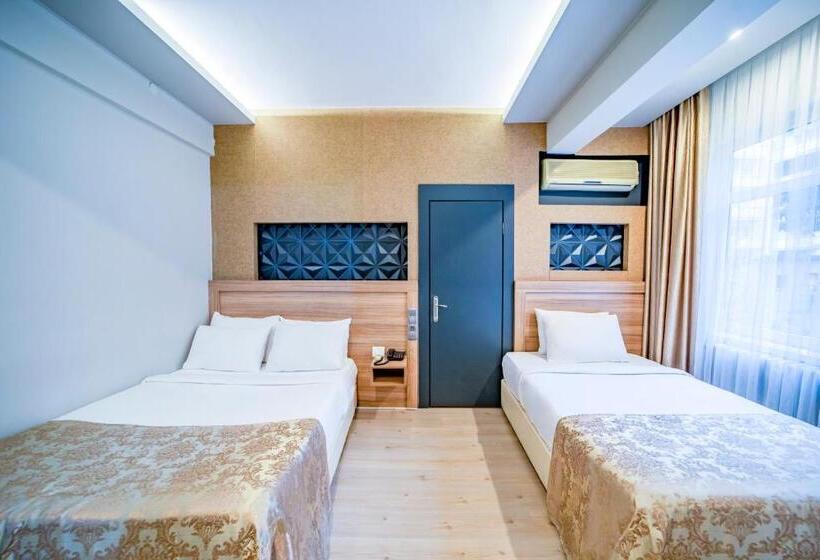 اتاق استاندارد سه تخته با چشم‌انداز باغ, Aksular