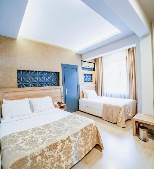 اتاق استاندارد سه تخته با چشم‌انداز باغ, Aksular