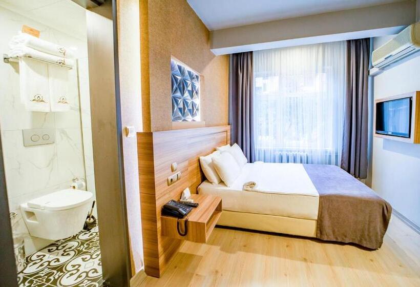 Quarto standart vista jardim, Aksular