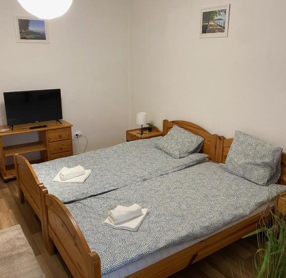 Семейный Номер Вид на Сад, Global Apartmanház