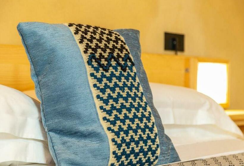 חדר דלוקס, Domu Bresca