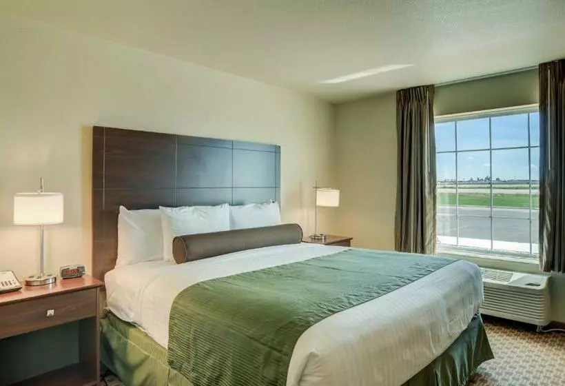 キングサイズベッドのデラックスルーム, Cobblestone Inn And Suites   Eaton