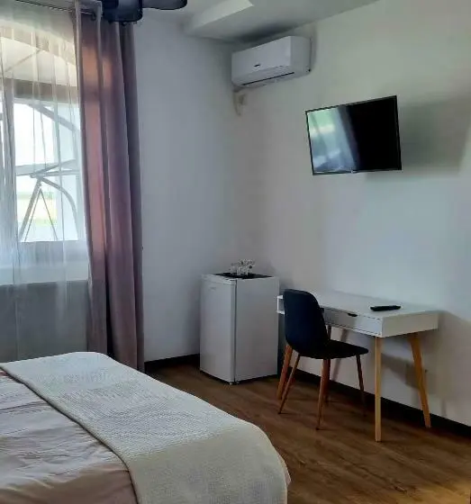 Quarto standart vista jardim, Denisa House