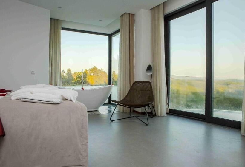 Deluxe Suite King Bed, Enigma Nature & Water
