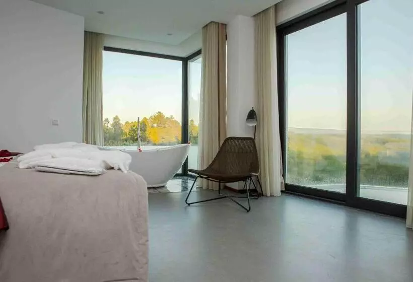 Deluxe Suite King Bed, Enigma Nature & Water