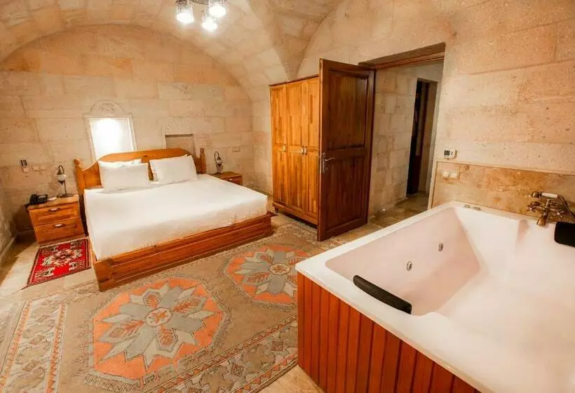 キングサイズベッドのスイートルーム, Caldera Cave Hotel & Restaurant