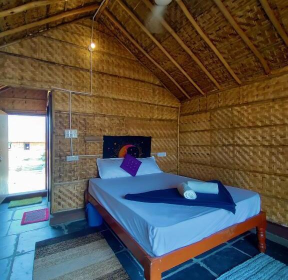 キングサイズベッドのスタンダードルーム, Hampi Natures Cottage