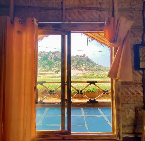 キングサイズベッドのスタンダードルーム, Hampi Natures Cottage