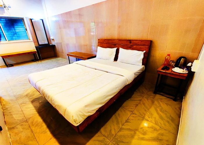 Kertre Néző Négyszemélyes Standard Szoba, Shrubbery Palms Resort