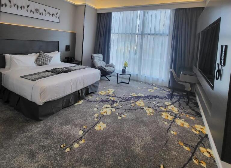 キングサイズベッドのデラックスルーム, Msharef Almoden