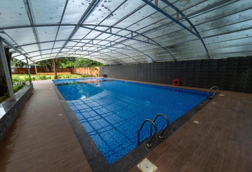 חדר דלוקס, Magizhvanam