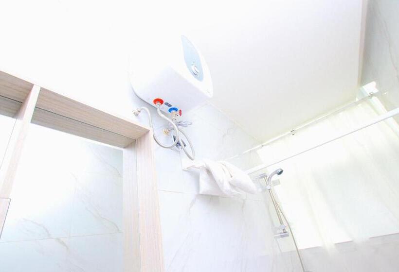 اتاق لوکس با تخت بزرگ, Appart Hotel Les Orchidees