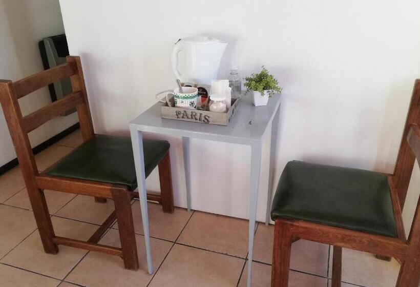 غرفة قياسية رباعية, Entre Viñas