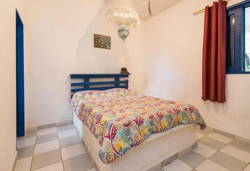 سوئیت جونیور با چشم‌انداز باغ, Hospedaria Lar Sagrado Arco íris