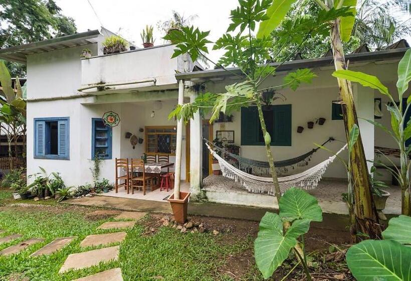 سوئیت جونیور با چشم‌انداز باغ, Hospedaria Lar Sagrado Arco íris