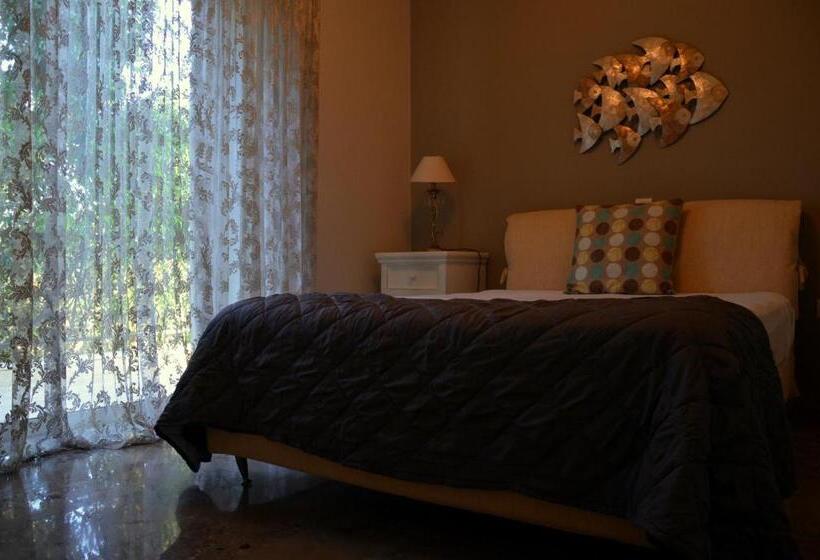 デラックスの4人部屋, Ammos Luxury Suites