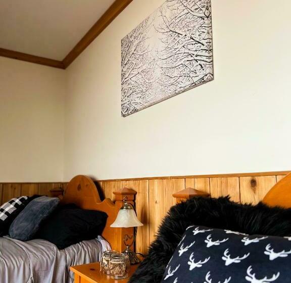 חדר לארבעה סטנדרטי עם נוף לגינה, Auberge Au Poste De Traite