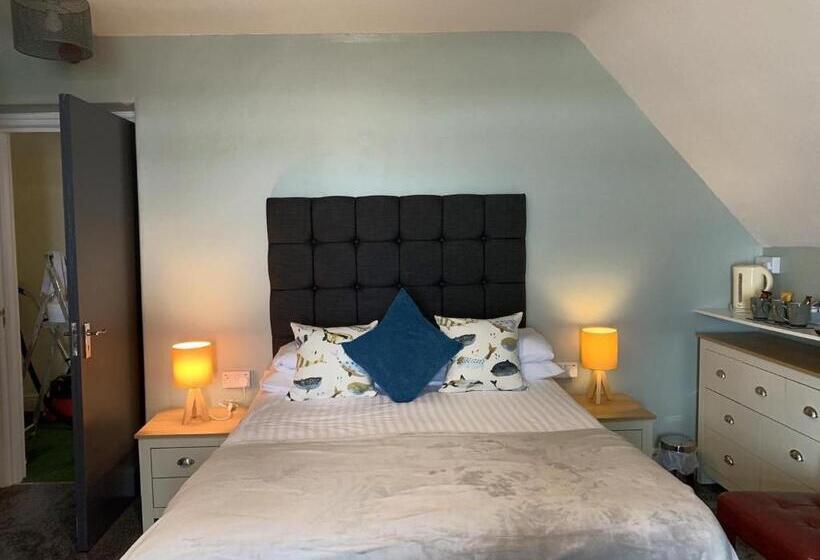 חדר משפחתי, Min Y Mor