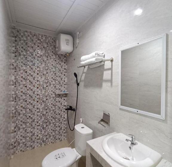 חדר דחוקס עם מיטת קינג, Grand Mulia Hotel Kisaran