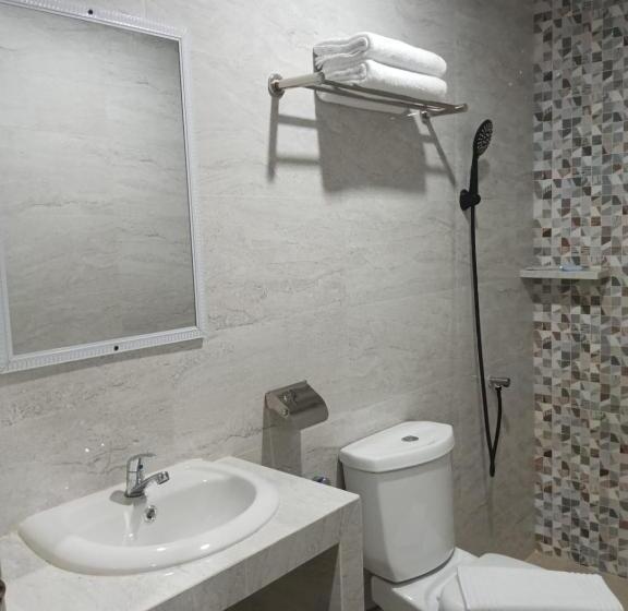 חדר דחוקס עם מיטת קינג, Grand Mulia Hotel Kisaran