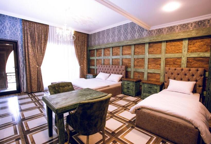 اتاق استاندارد سه تخته با چشم‌انداز باغ, Aynur Qala Resort