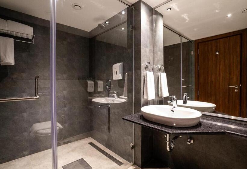 キングサイズベッドのスタンダードルーム, Lilac Hotel Guruvayur