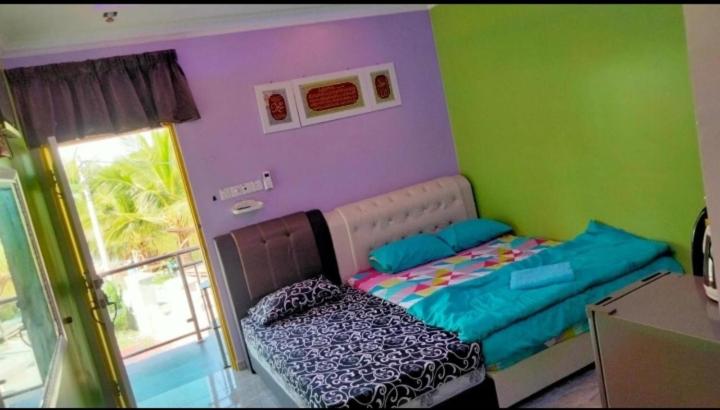 غرفة قياسية ثلاثية مزودة بشرفة, Airport Kota Bharu Roomstay & Riverside Homestay
