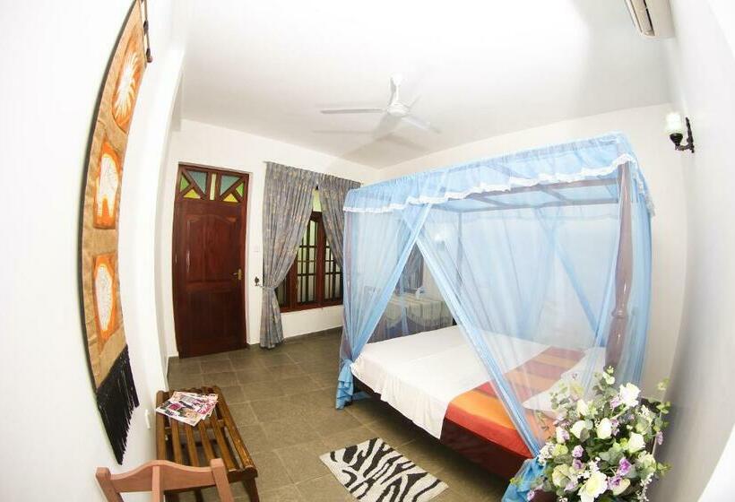 Quarto Deluxe Vista Mar, Mother's Place Nimala