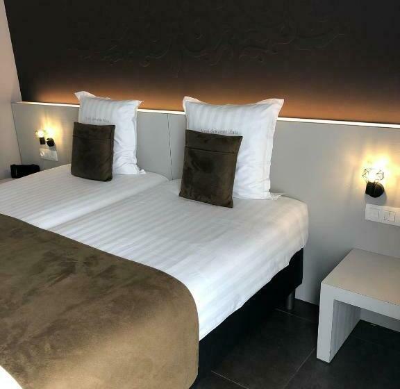 Номер Стандарт, Gemeente Huis