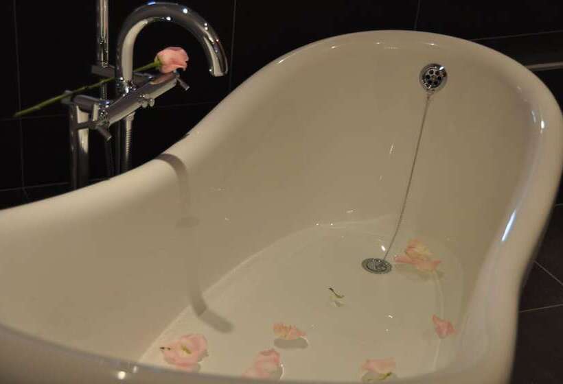 デラックスルーム, Het Heilig Genot