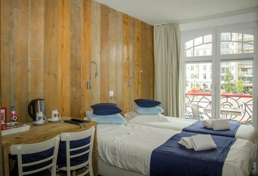 Номер Стандарт, Aan Zee