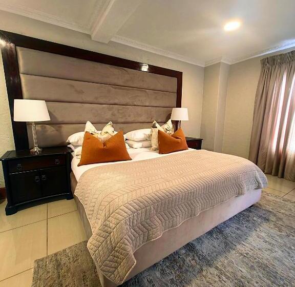 חדר דלוקס לשלושה, Indlovu Guesthouse