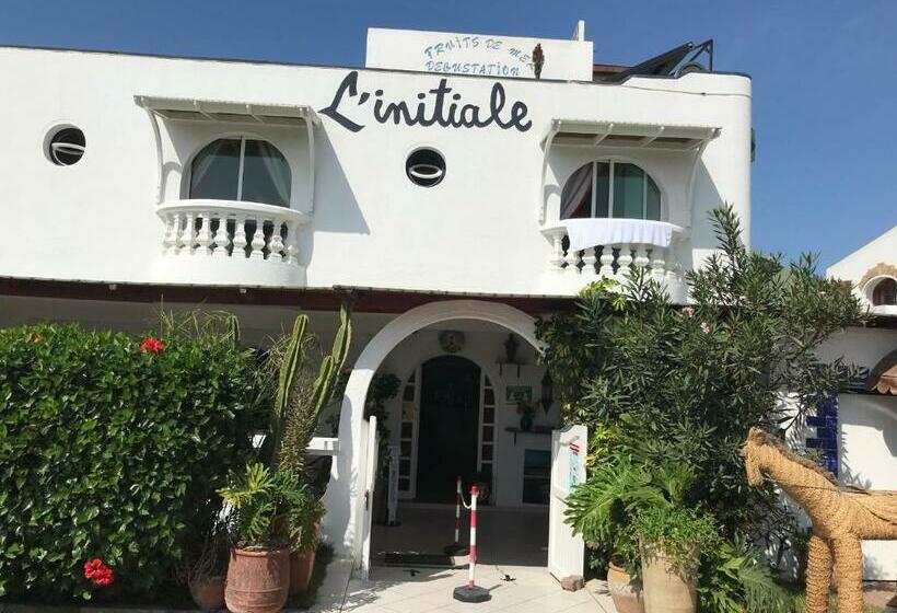 Номер Стандарт, L'initiale