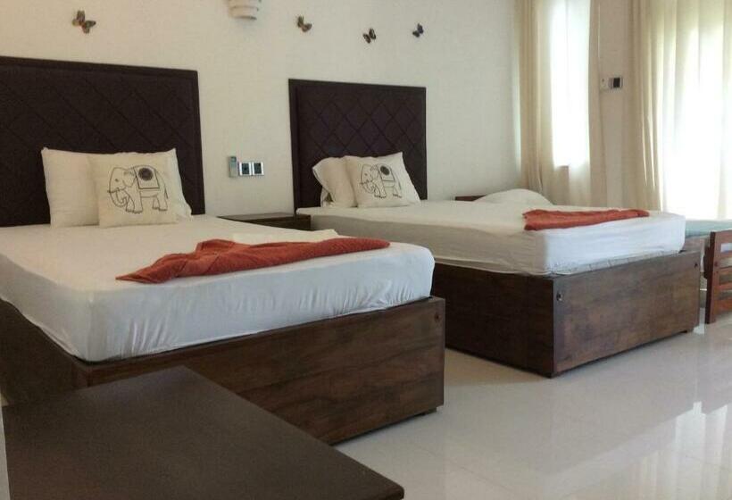 Habitació Triple Deluxe, Lemazone Inn