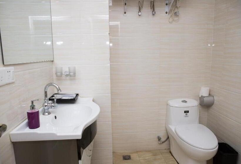 キングサイズベッドのデラックスルーム, Waifiden Guangzhou Haizhu Square Wanyi Apartment