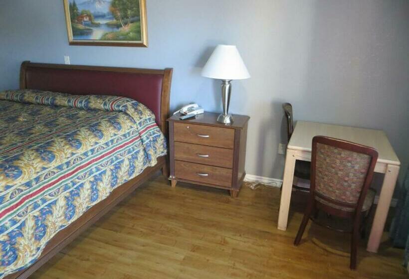 חדר סטנדרט עם מיטת קינג, Mustang Inn And Suites